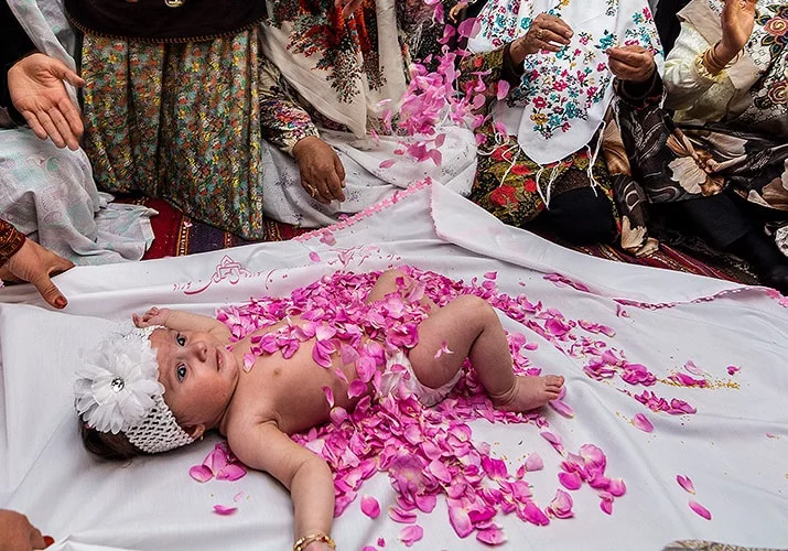 Infants Rolling in Flowers 1